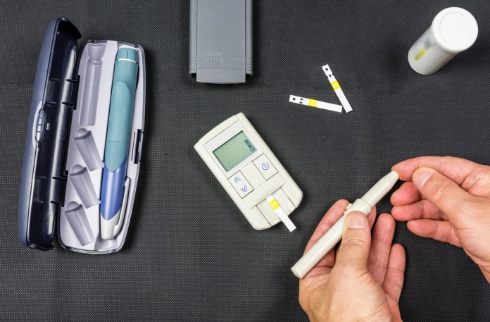 A person checking their blood sugar, which can be good for managing diseases like diabetes