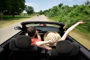 Couple Driving Down Country Road